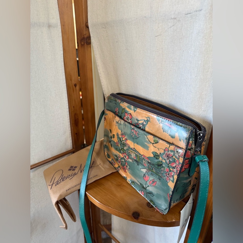 Patricia Nash "Beautiful Girl" print leather crossbody bag.